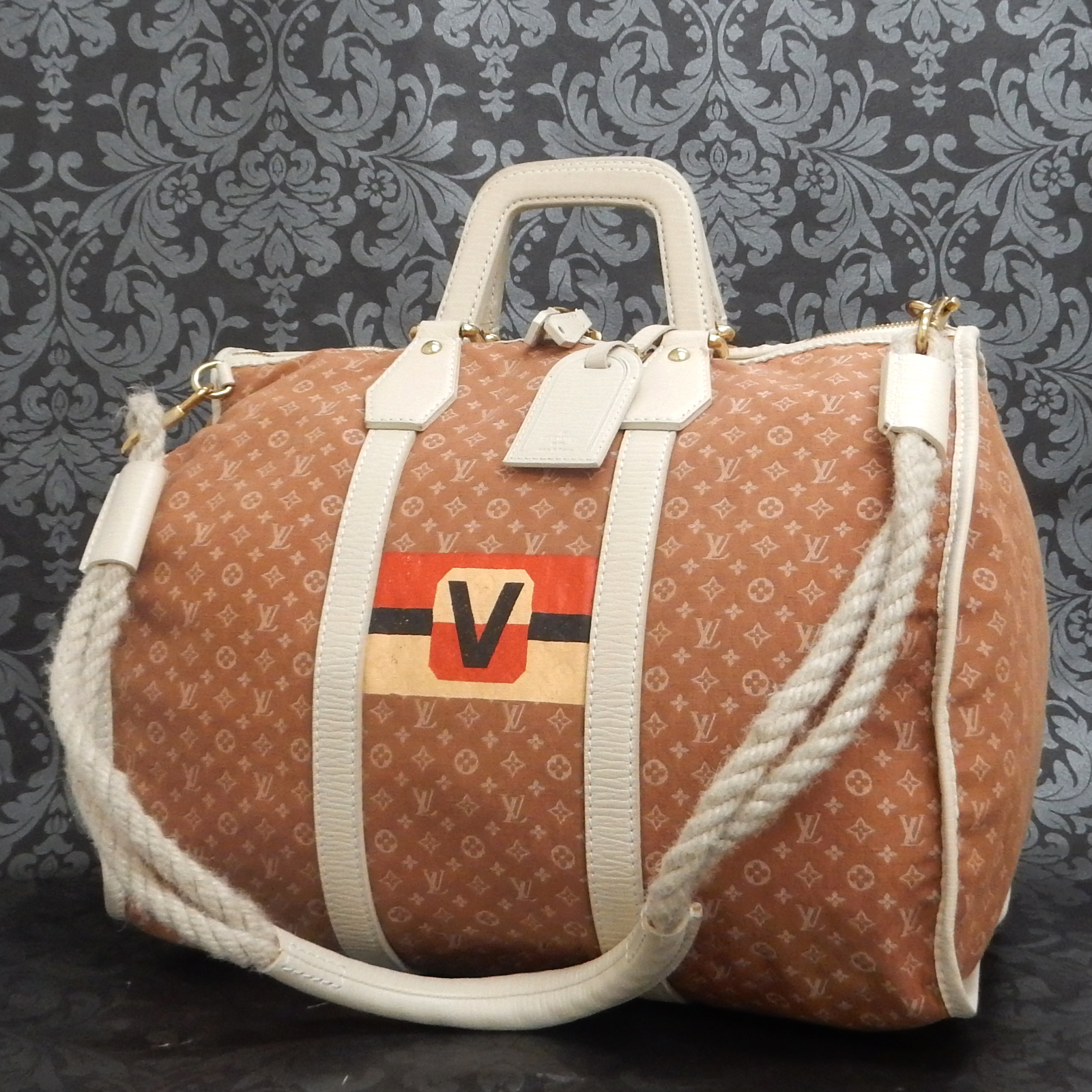 mini louis vuitton duffle bag