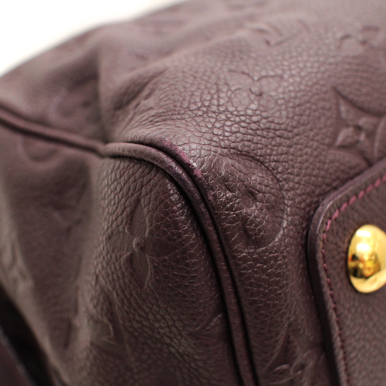 Louis Vuitton Purple Monogram Empreinte Spontini Leather Pony